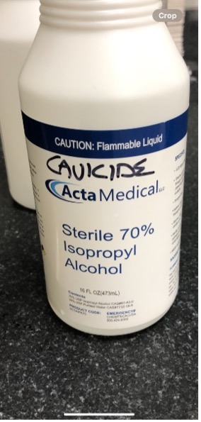Cavicide | ACHC.ORG Bottle labeled Sterile 70% Isopropyl Alcohol by Acta Medical; CAUTION: Flammable Liquid.